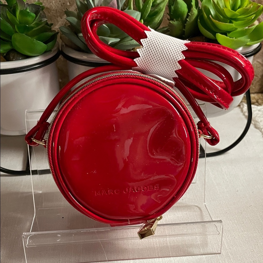 Marc Jacobs Red Round Crossbody Bag 4” in diameter and metal mirror leather tag